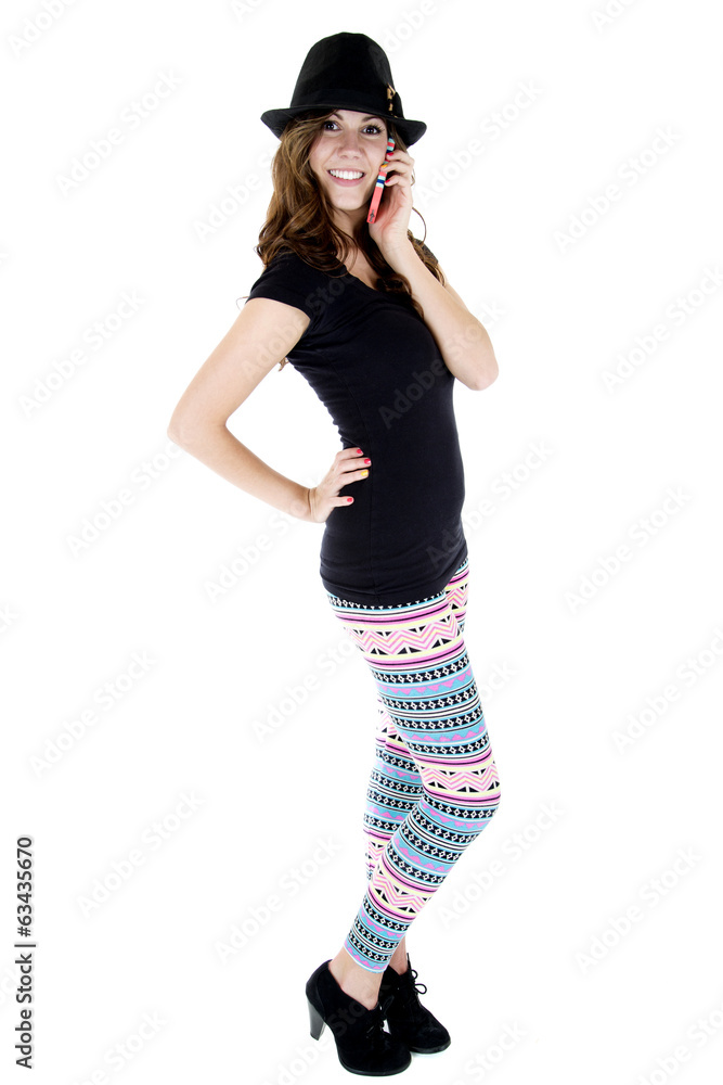 female model talking on her cellphone in colorful leggings female model talking on her cellphone in colorful leggings