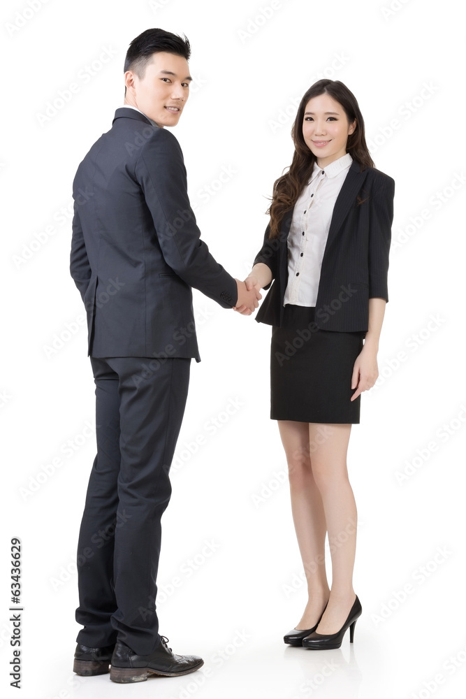 Business woman and man shake hands