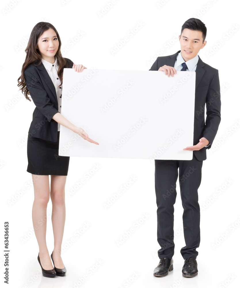 Business man and woman holding blank white board Business man and woman holding blank white board