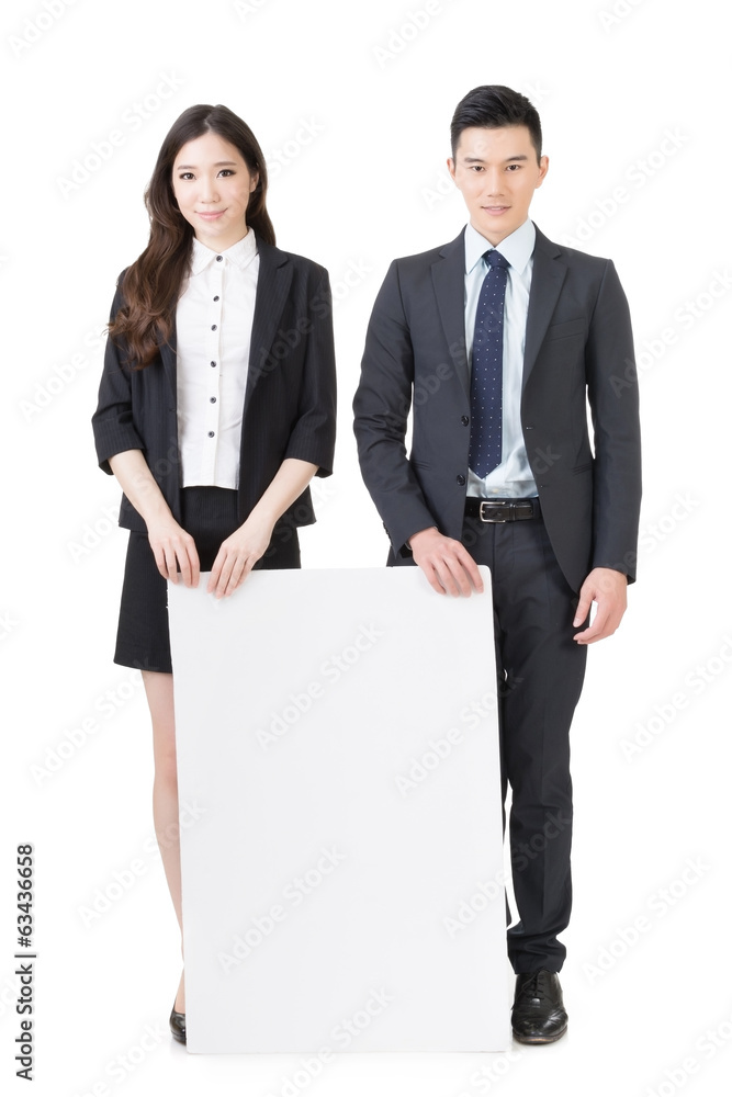 Business man and woman holding blank white board Business man and woman holding blank white board