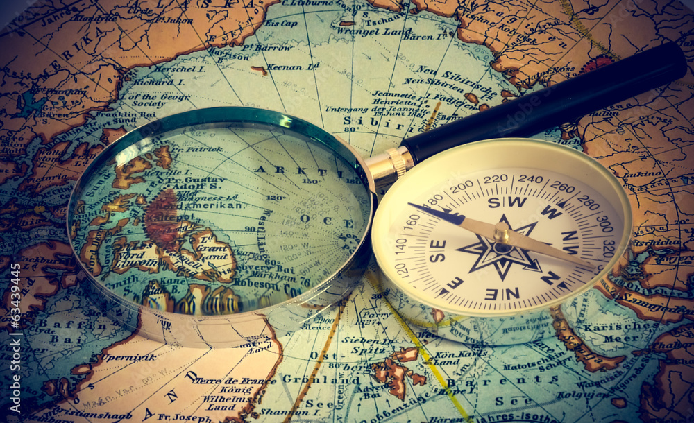 compass and magnifying glass