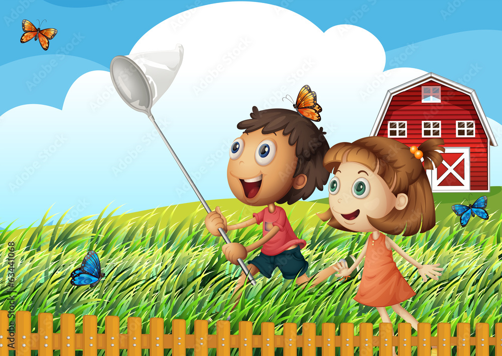Fototapeta premium Kids catching butterflies at the field
