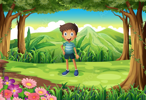 A jungle with a smiling little boy
