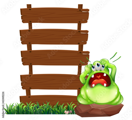 A fat monster above the rock beside the empty signboards