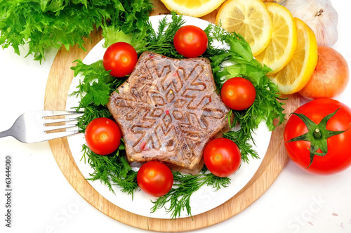 jellied meat with fresh herbs and cherry tomatoes