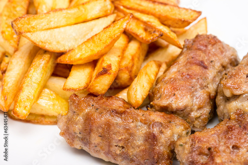 Romanian Meatballs Or Mici And Fried Chips