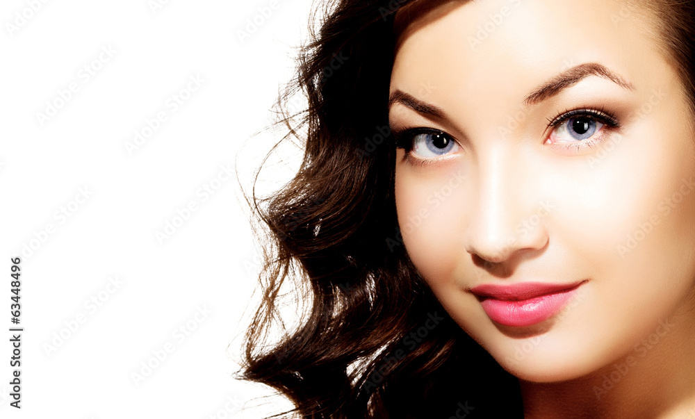 Fototapeta premium Pretty girl with long hair, white background, copyspace.