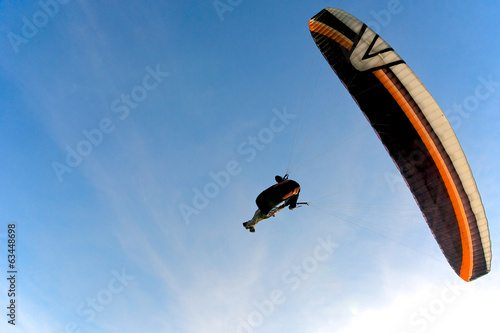 Paraglider in flight, Italy