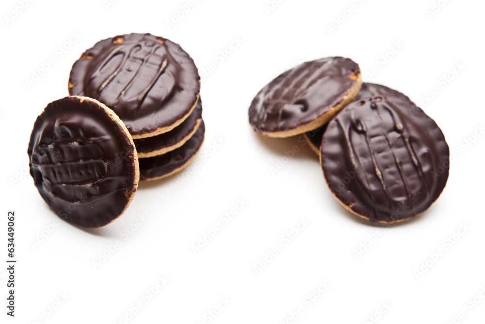 Obraz premium Chocolate pieces on a white background