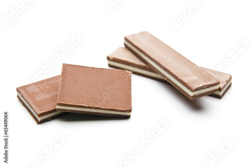 Chocolate pieces on a white background