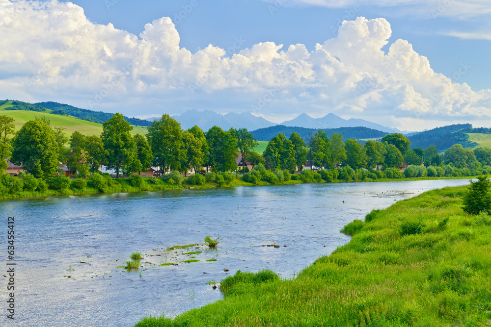 Spring landscape with. The Tatras over The Dunajec River.