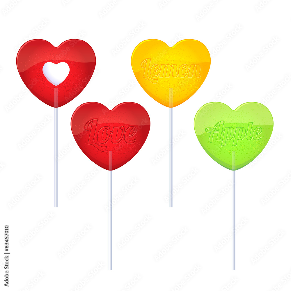 Set of colorful heart-shaped lollipops on white background.