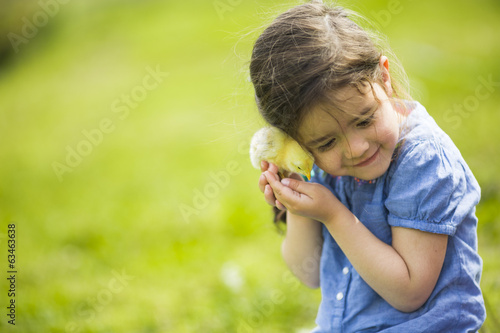 Cute girl with the chicken