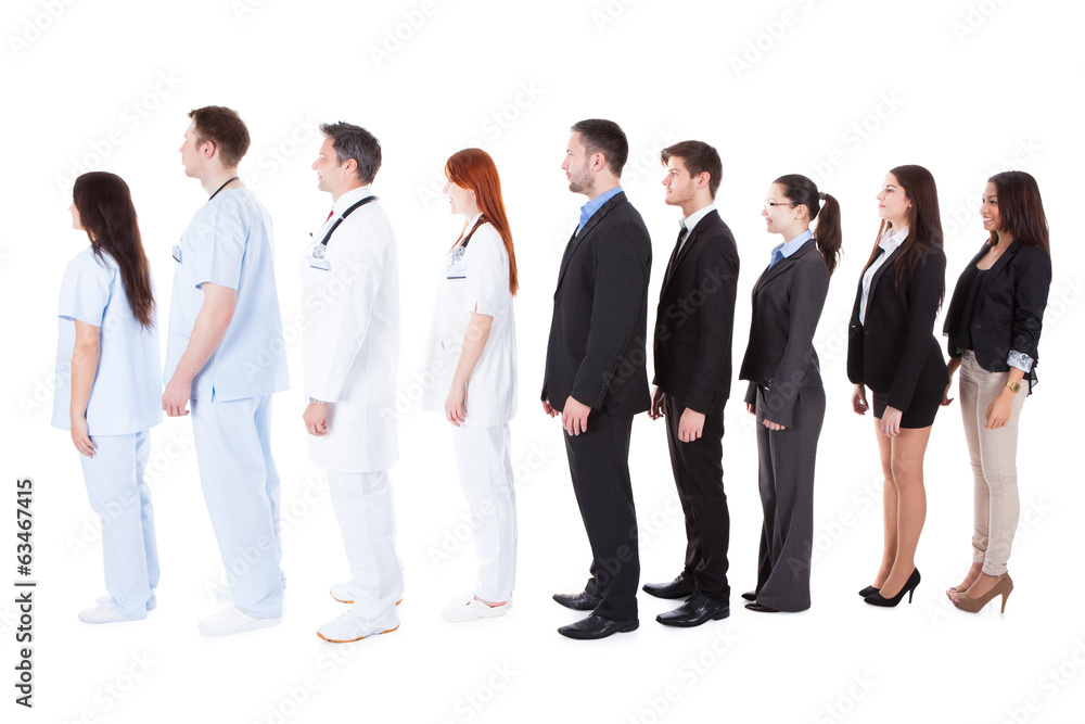 Doctors and managers standing in queue Doctors and managers standing in queue