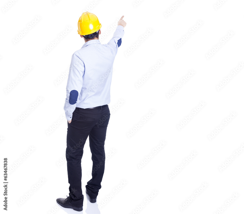 Engineer pointing at something, isolated on white Engineer pointing at something, isolated on white