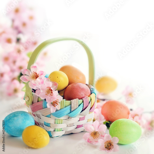 Spring Easter egs and flowers in a basket