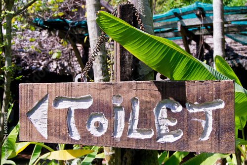 wood toilet sign