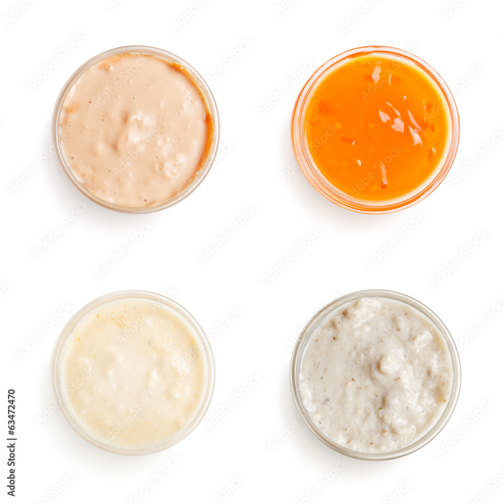sauces in a gravy boat on white background sauces in a gravy boat on white background