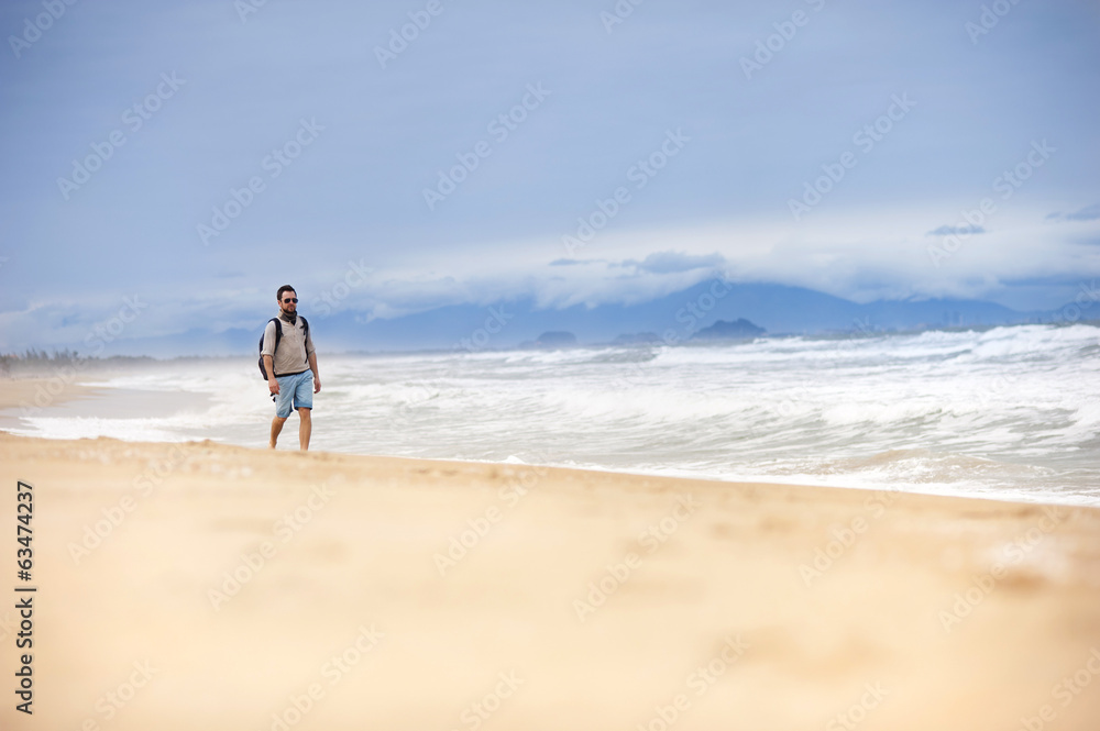 Man walking on the beach