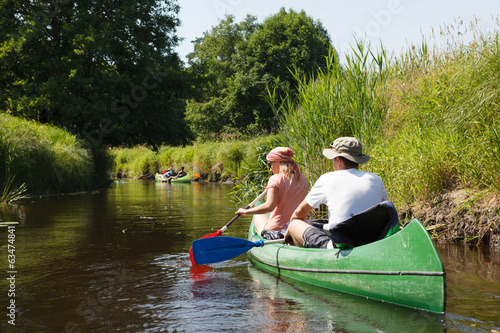 People boating on river