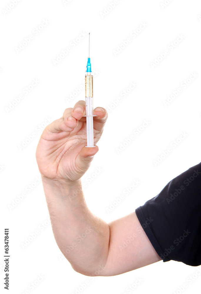 Syringe in a Hand Syringe in a Hand
