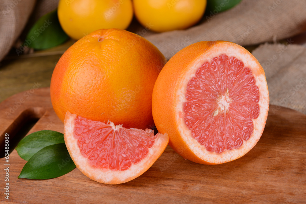 Ripe grapefruit on table close-up Ripe grapefruit on table close-up
