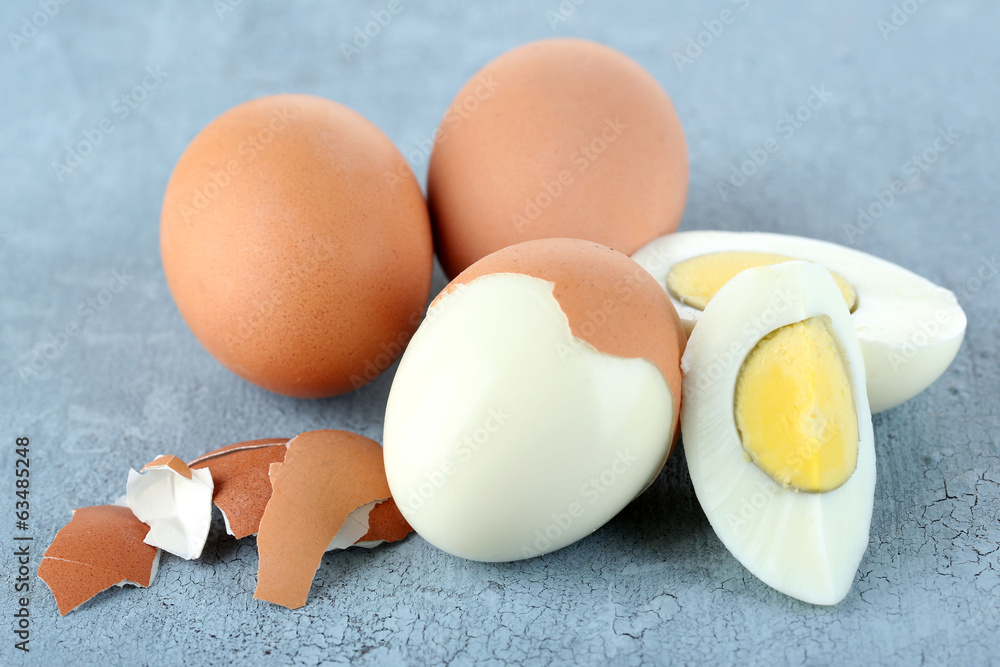 Boiled eggs on color wooden background Boiled eggs on color wooden background