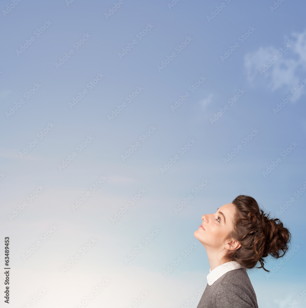 Girl looking at the blue sky copyspace Girl looking at the blue sky copyspace
