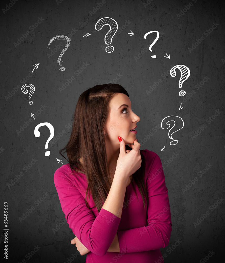 Young woman thinking with question mark circulation around her h Young woman thinking with question mark circulation around her h