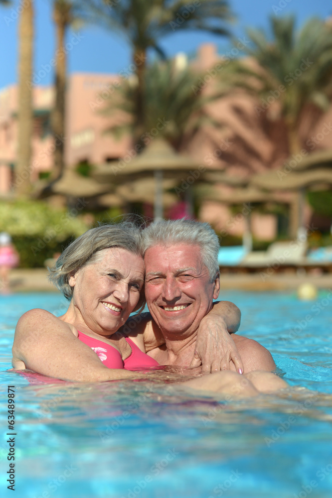 Senior couple in pool