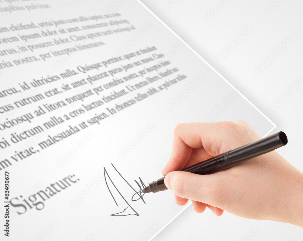 Hand writing personal signature on a paper form Hand writing personal signature on a paper form