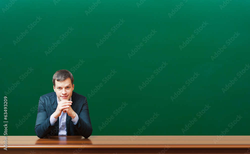 professor against chalkboard background professor against chalkboard background
