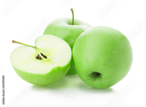 green apples and apple slices on white background