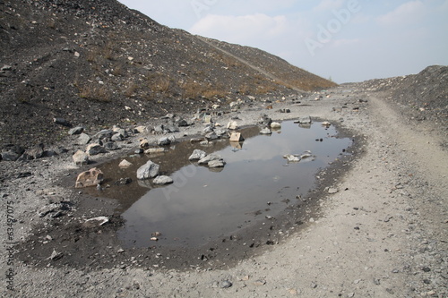 Puddle on heap of mine