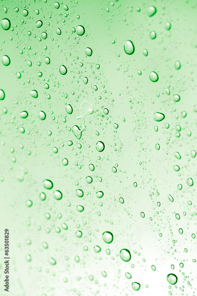 water drops on green glass. macro
