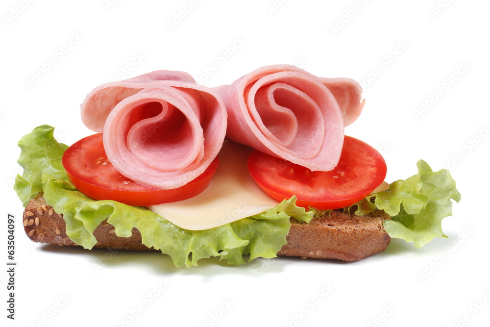 festive sandwich with ham and vegetables isolated