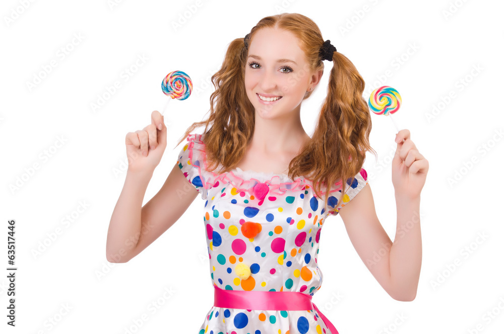 Redhead young girl with lolipops isolated on white Redhead young girl with lolipops isolated on white