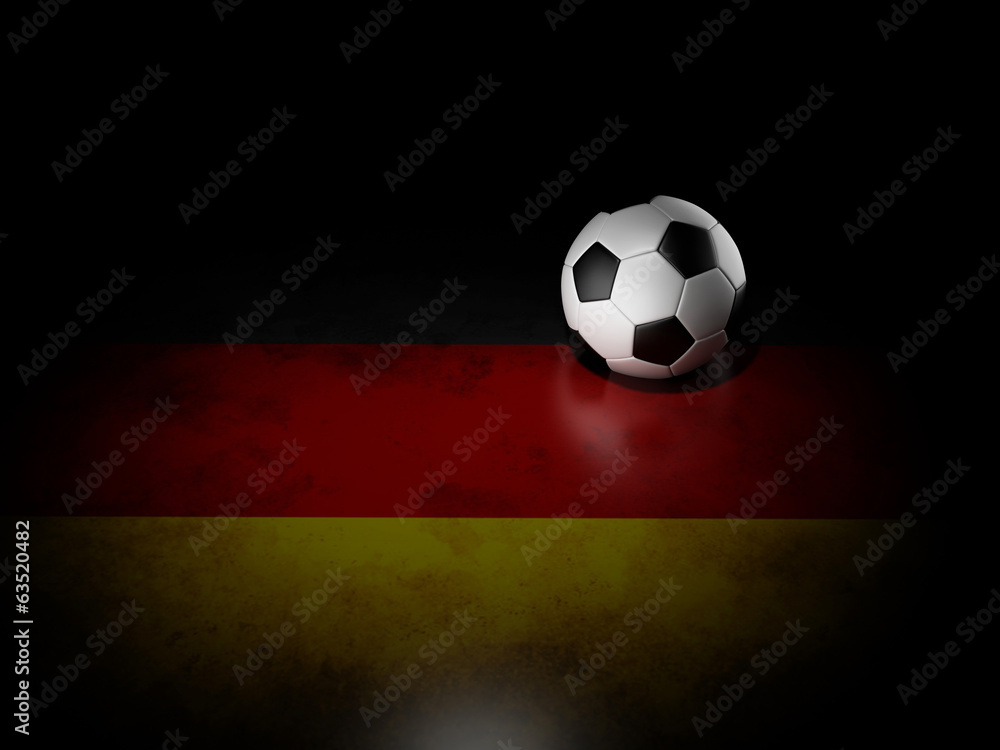 Naklejka premium Soccer ball with german flag