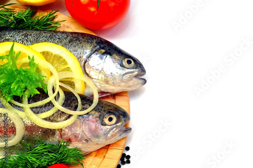 Fototapeta Naklejka Na Ścianę i Meble -  trout on a plate with vegetables