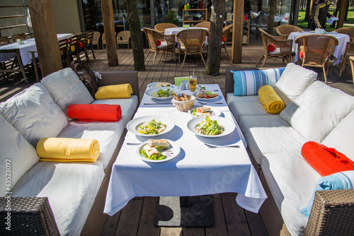 Canvastavla Served table at summer terrace cafe