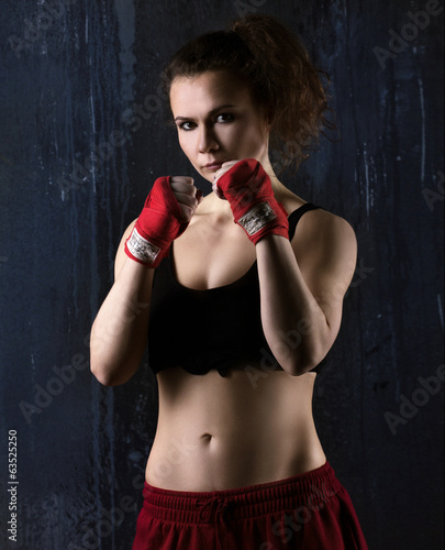 young woman boxer © zaretska