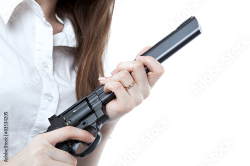 young girl holding a pistol