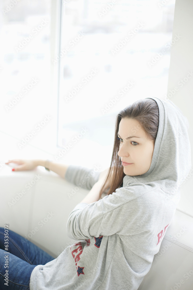 Girl sitting on the couch