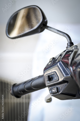 Motorcycle handlebars with buttons and side mirrors