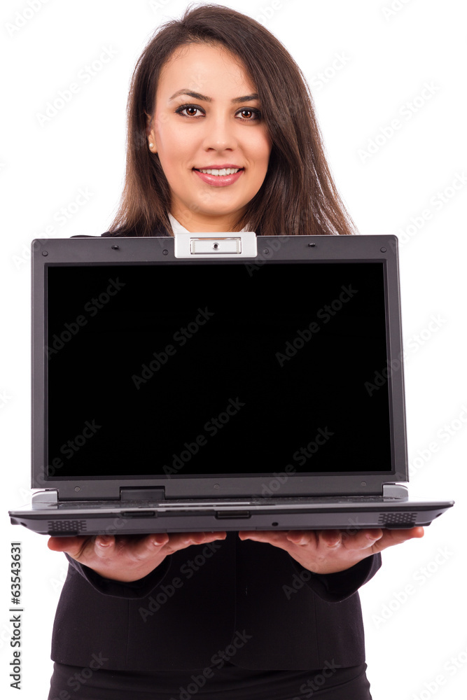 Beautiful young businesswoman holding a laptop Beautiful young businesswoman holding a laptop