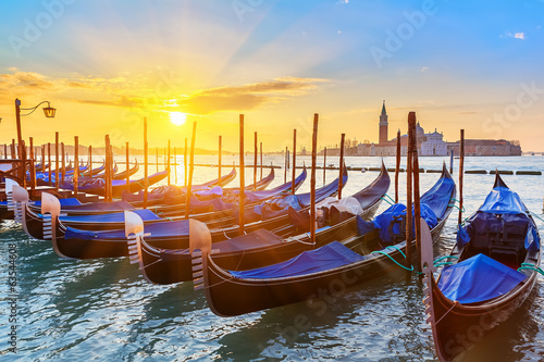 Venetian gondolas at sunrise photo