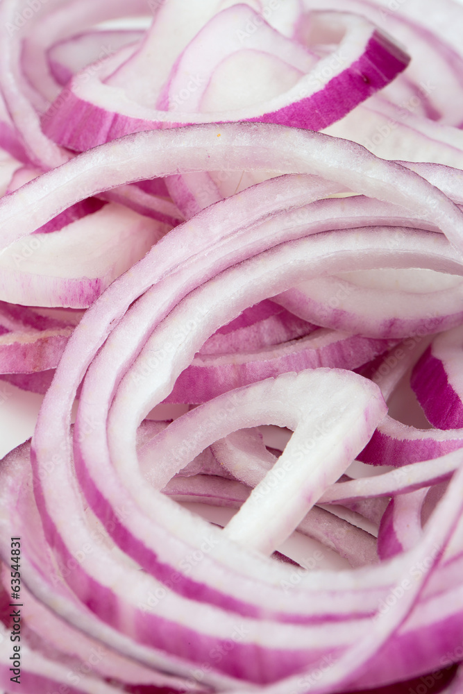 slices of red onion isolated on white