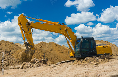 Construction scenery - excavator in trench