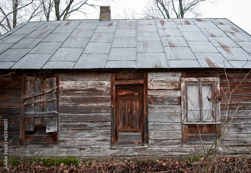 old wooden cottage on polish countryside, Mazovia region