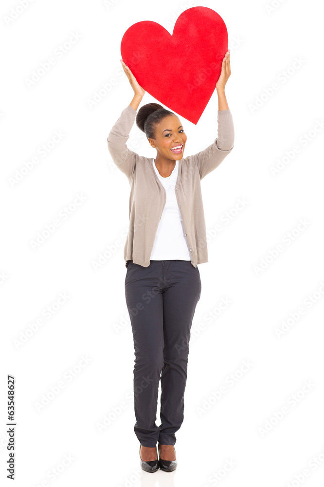 african american woman holding heart shape african american woman holding heart shape